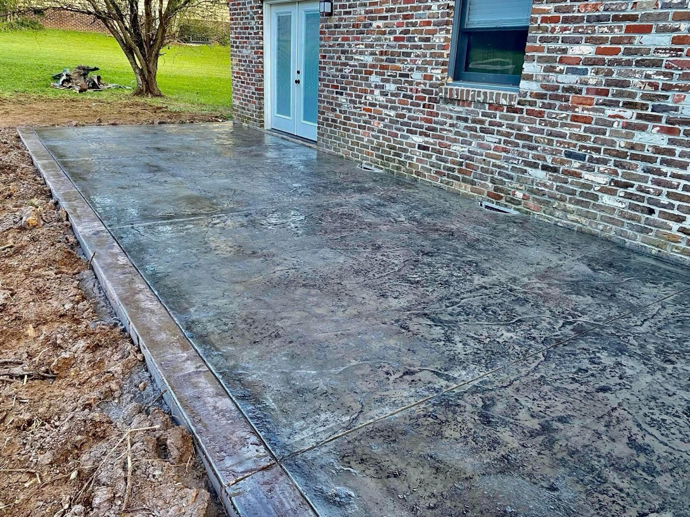 Gray slate stamped concrete patio