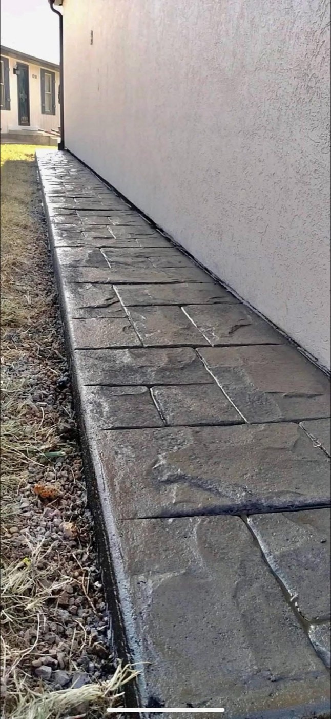 Gray stamped concrete walkway